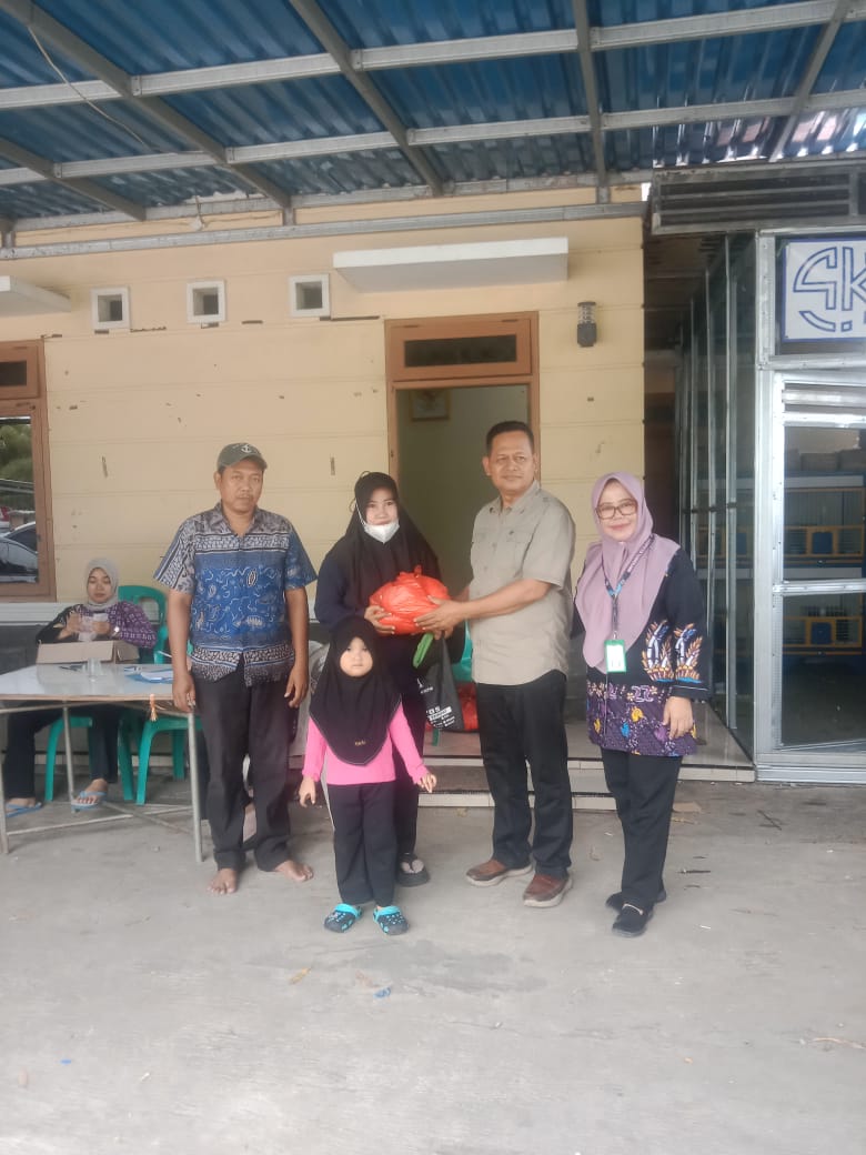 Pembagian sembako pasar pangan Murah di Desa Ketapang kecamatan mauk  berjalan lancar.