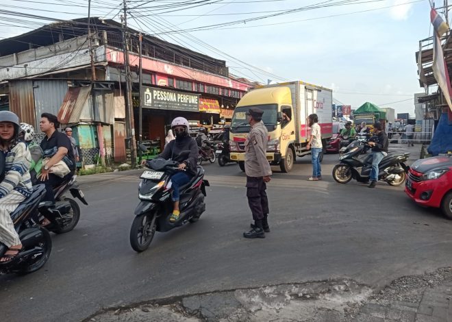 Polsek Curug Laksanakan Pengaturan Lalu Lintas di Perempatan Gloria