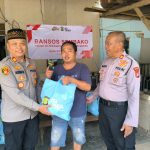 Tangis Haru Warga Bencongan Sambut Bantuan Polsek Kelapa Dua pada HUT Bhayangkara ke-80